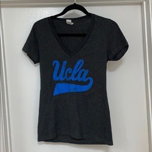 Women’s UCLA v-neck top size M-runs small